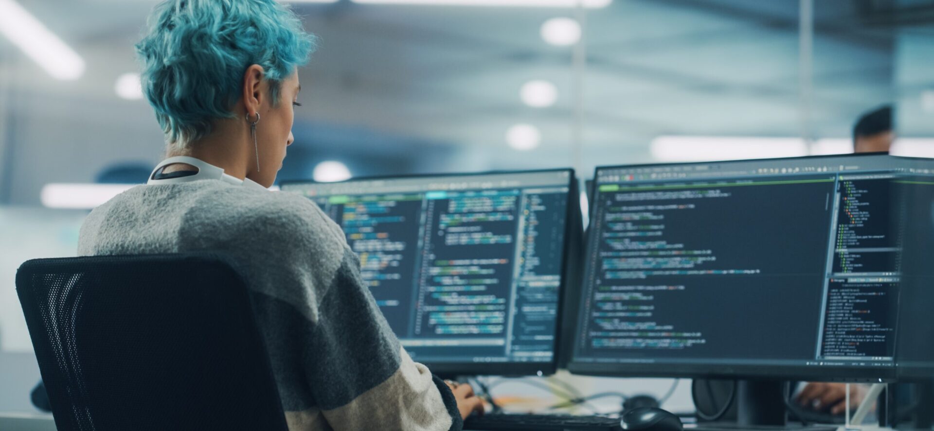 In Diverse Office: Young Stylish Woman in Working on Desktop Com